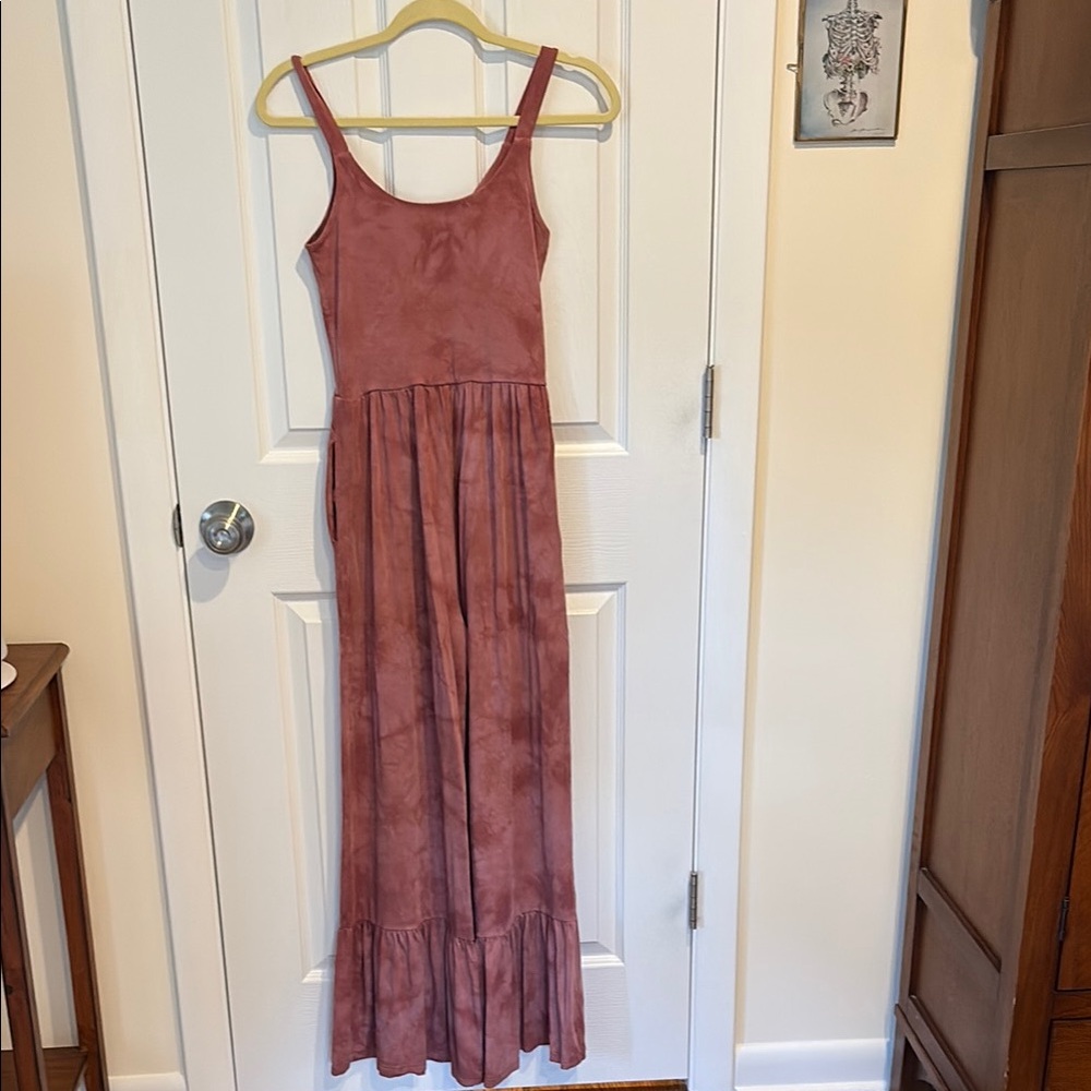 Pink and Purple Ruffled Tiered Sleeveless Jumpsuit
NWOT. Beautiful!!